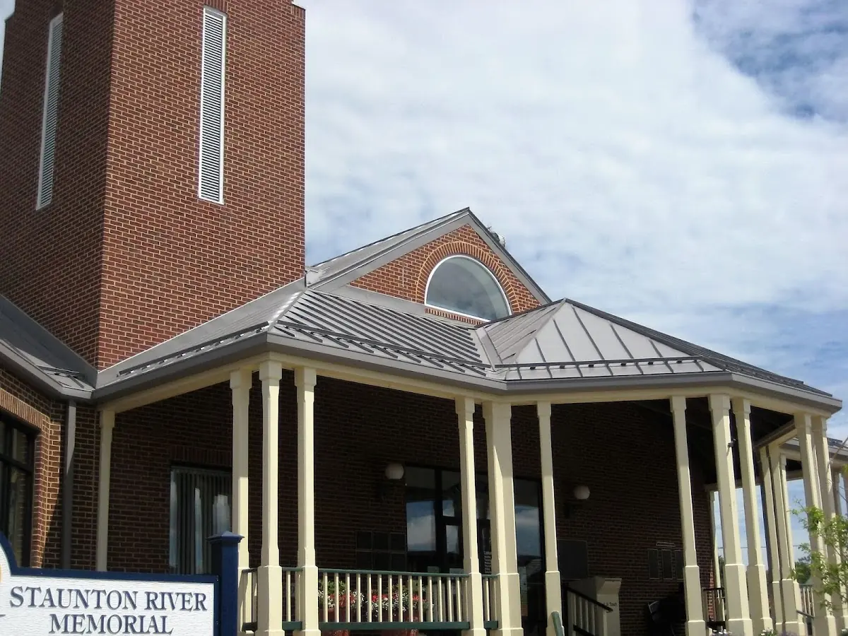 Skilled roofing craftsmen working on a residential roof in Jonesboro
